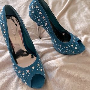 Teal embellished platform pumps